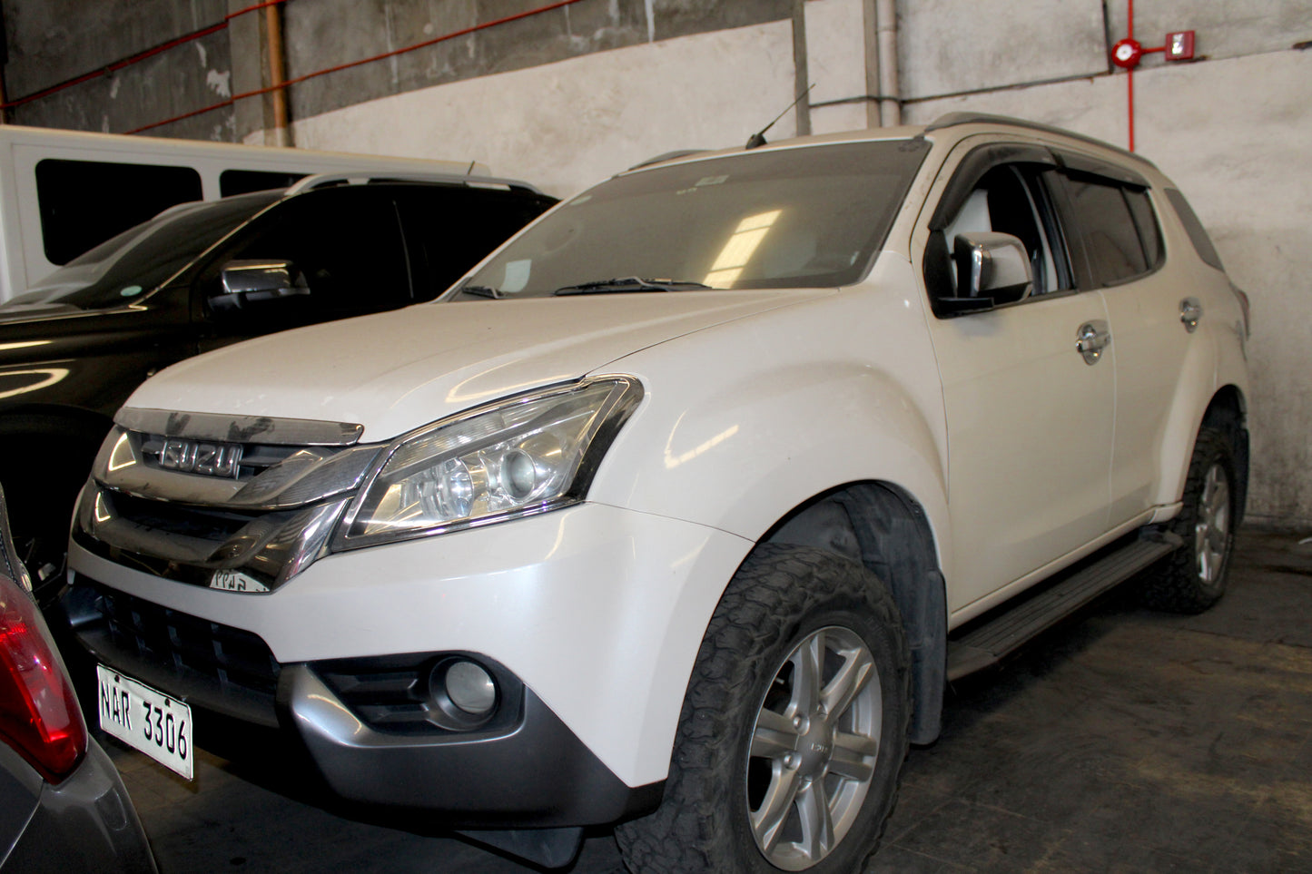2017 Isuzu MU-X Manual Transmission Diesel with 156,000 km mileage available at ROPO - Quality Pre-Owned Cars in Metro Manila, Philippines.