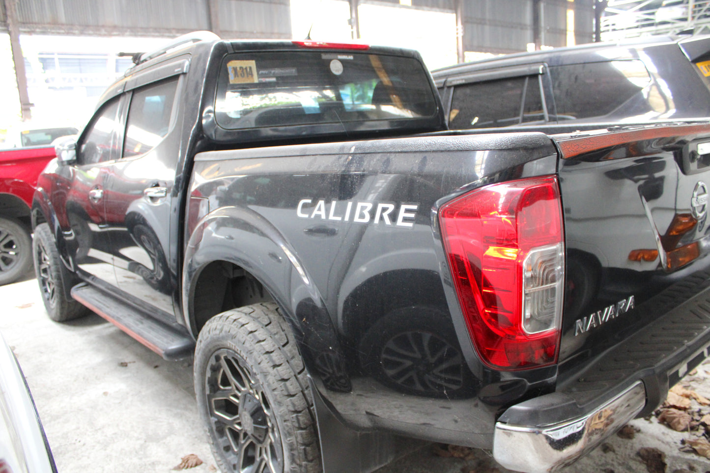 2020 Nissan Navara NP300 EL Calibre 4x2 2.5L Automatic Diesel with 201,000 km mileage, upgraded features, available at ROPO - Quality Pre-Owned Cars in Metro Manila, Philippines.