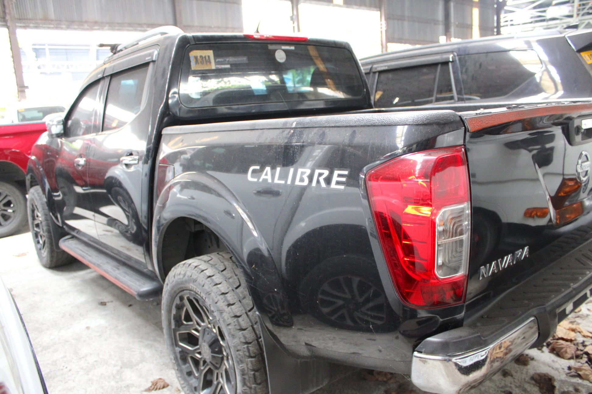 2020 Nissan Navara NP300 EL Calibre 4x2 2.5L Automatic Diesel with 201,000 km mileage, upgraded features, available at ROPO - Quality Pre-Owned Cars in Metro Manila, Philippines.