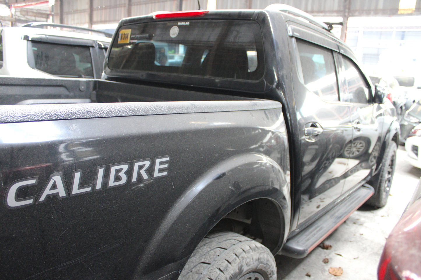 2020 Nissan Navara NP300 EL Calibre 4x2 2.5L Automatic Diesel with 201,000 km mileage, upgraded features, available at ROPO - Quality Pre-Owned Cars in Metro Manila, Philippines.