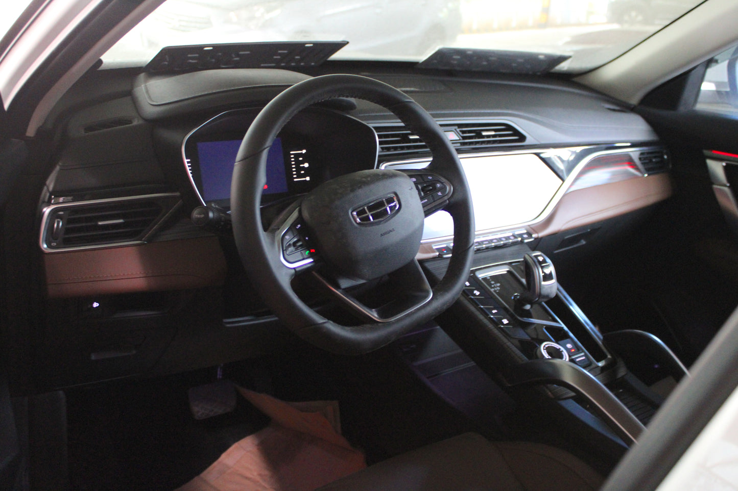 2023 Geely Azkarra Luxury 1.5 Automatic Gasoline with 7,000 km mileage and Unencumbered CR available at ROPO - Quality Pre-Owned Cars in Metro Manila, Philippines.