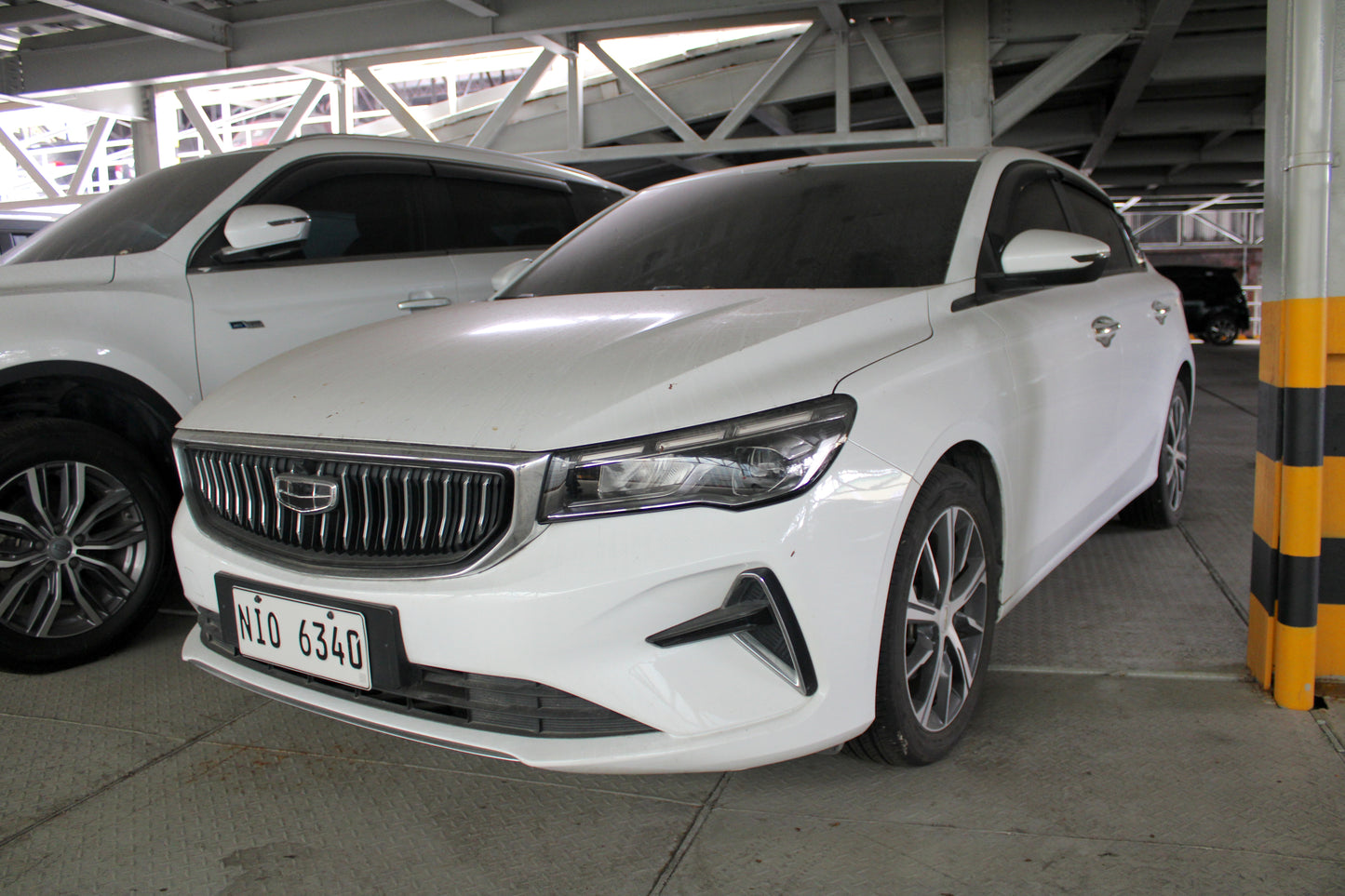 2023 Geely Emgrand Comfort Automatic Gasoline with 12,000 km mileage available at ROPO - Quality Pre-Owned Cars in Metro Manila, Philippines.