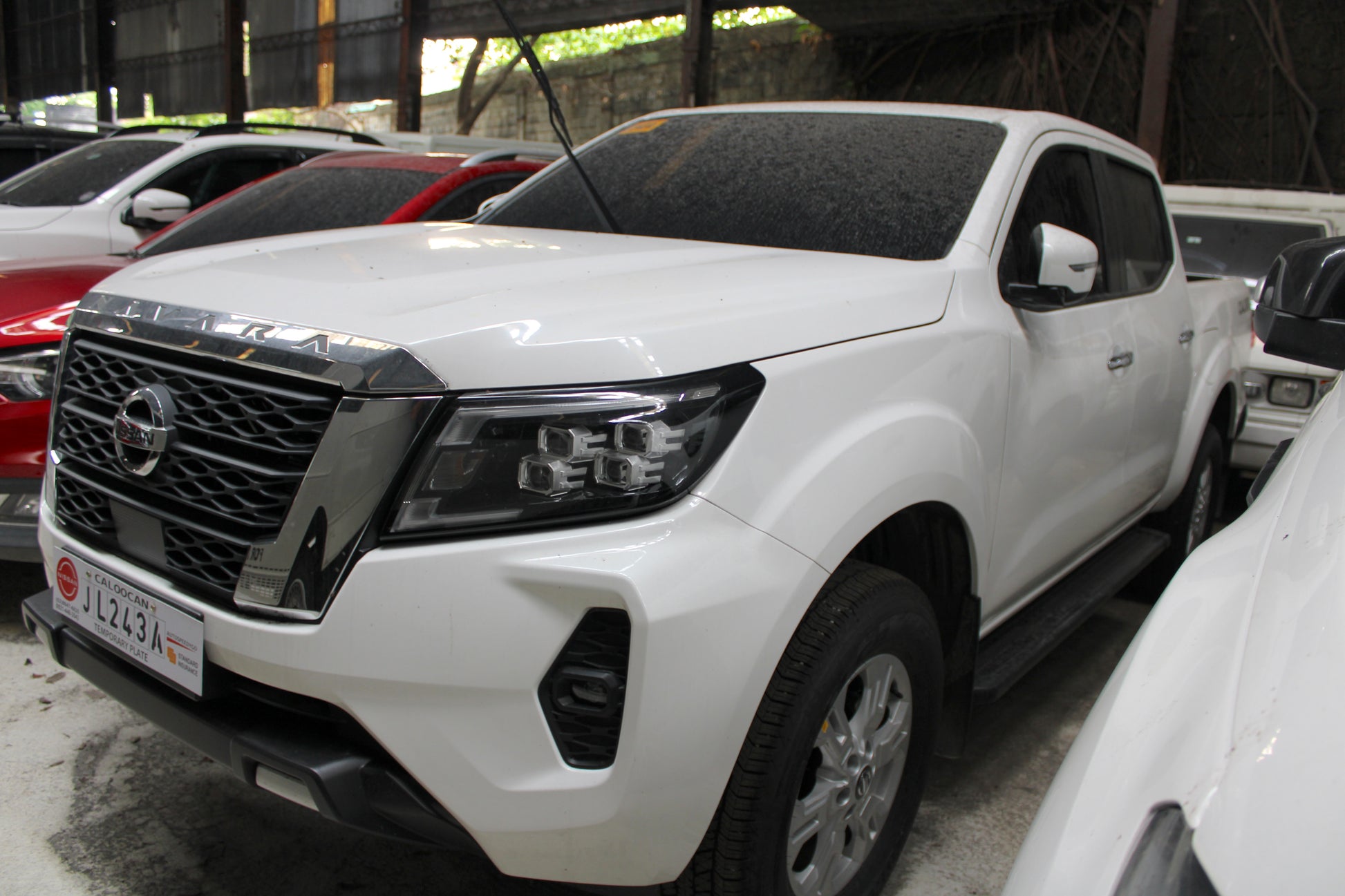 2024 Nissan Navara VE 2.5L 4x2 Manual Transmission Diesel with 1,000 km mileage and unencumbered CR available at ROPO - Quality Pre-Owned Cars in Metro Manila, Philippines.