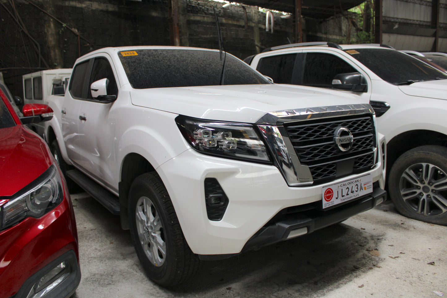 2024 Nissan Navara VE 2.5L 4x2 Manual Transmission Diesel with 1,000 km mileage and unencumbered CR available at ROPO - Quality Pre-Owned Cars in Metro Manila, Philippines.